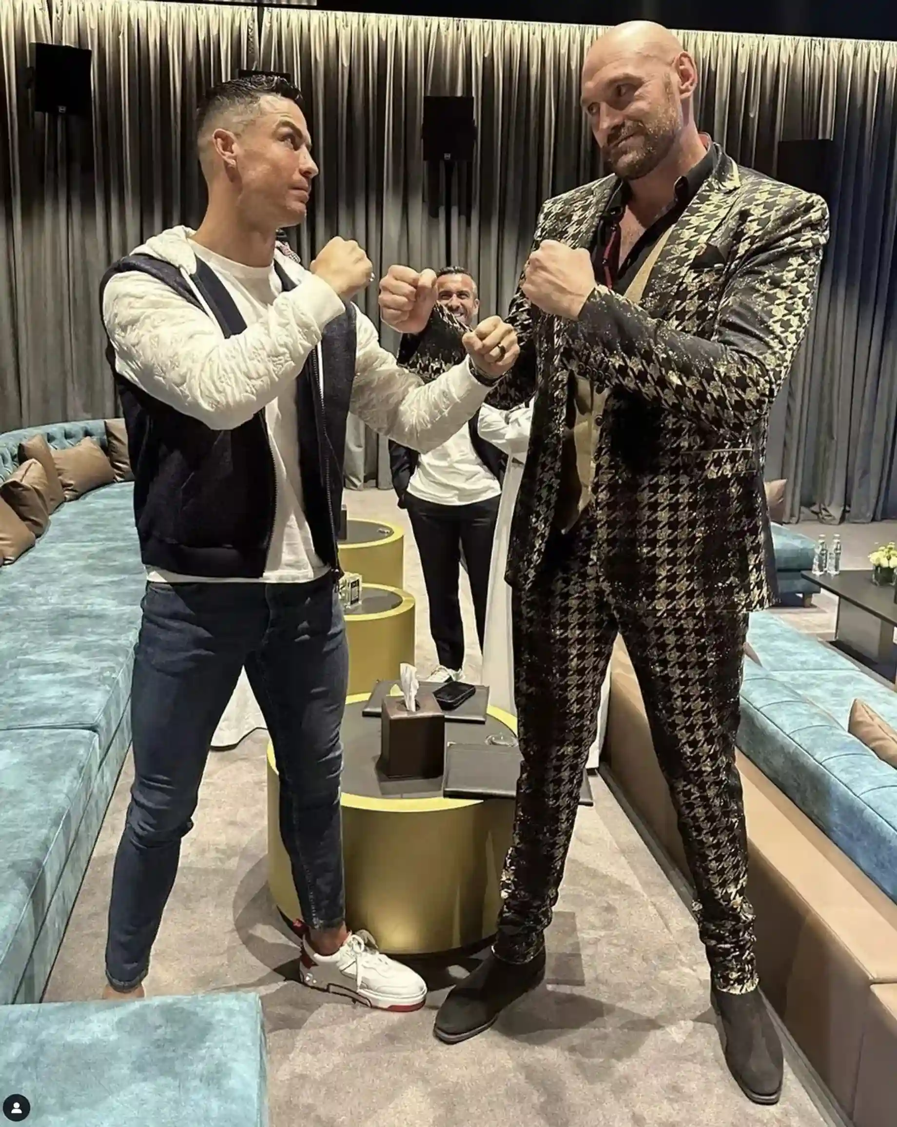 Cristiano Ronaldo Playfully Poses With Fists Up Alongside Tyson Fury Before His Boxing Match in Jeddah.