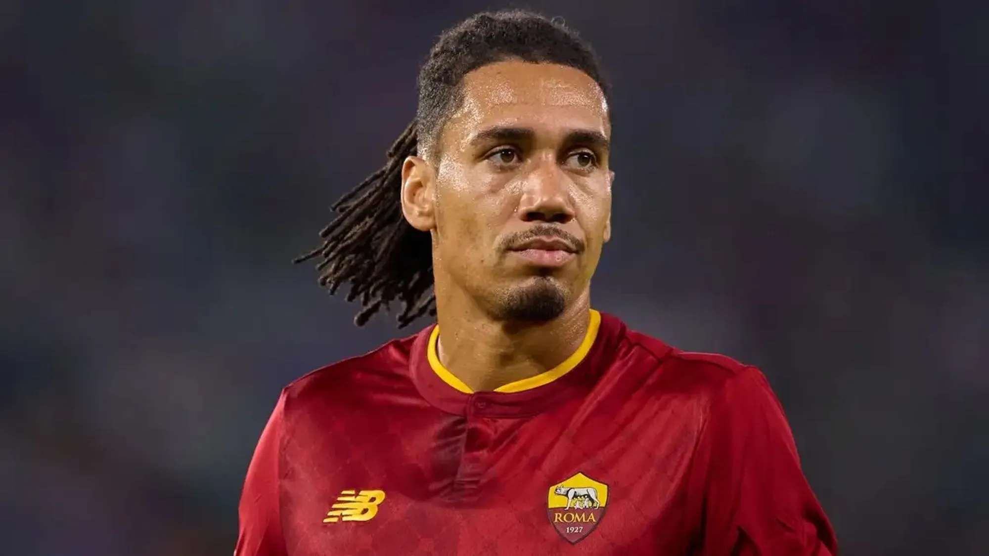 Chris Smalling in AS Roma's red home kit during a past match.