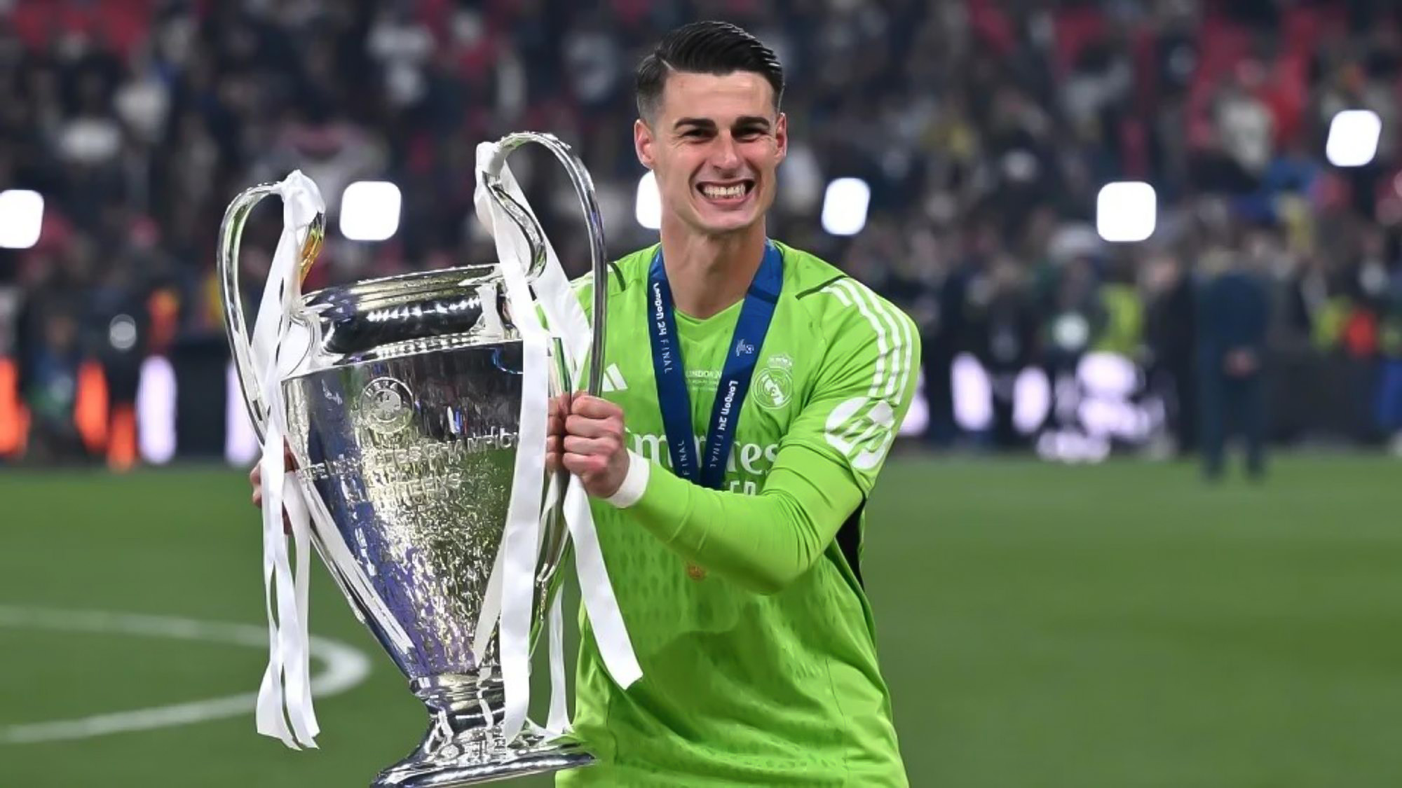 Kepa Arrizabalaga All Smiles While Holding the Champions League Trophy Won While on Loan at Real Madrid