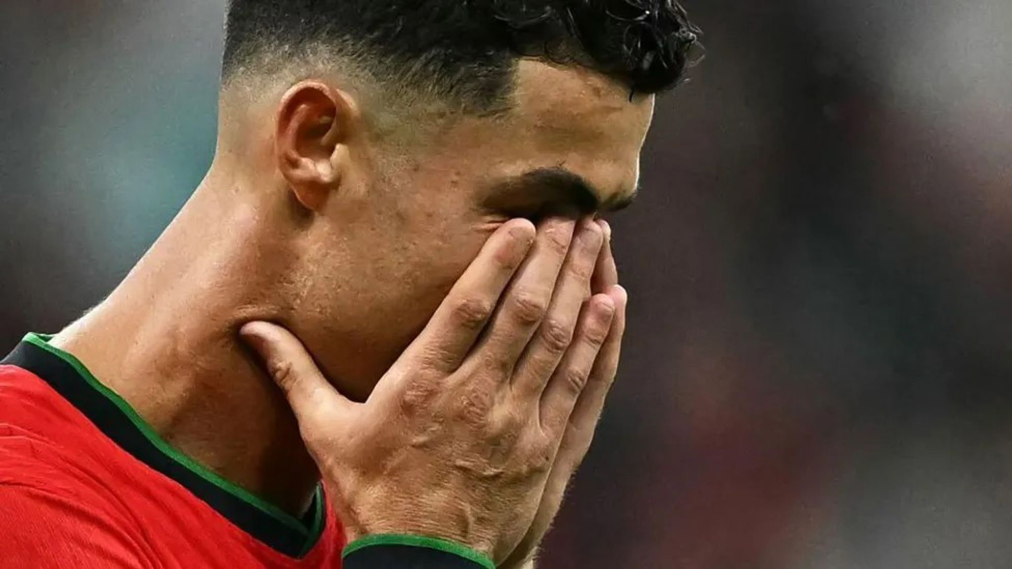 Cristiano Ronaldo Wipes His Tears After a Frustrating Performance Capped by His Penalty Being Saved.