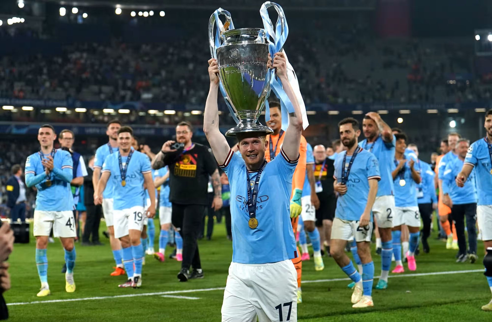 Kevin De Bruyne Lifts the UEFA Champions League Trophy, Marking The Accomplishment of Winning All Trophies At Club Level