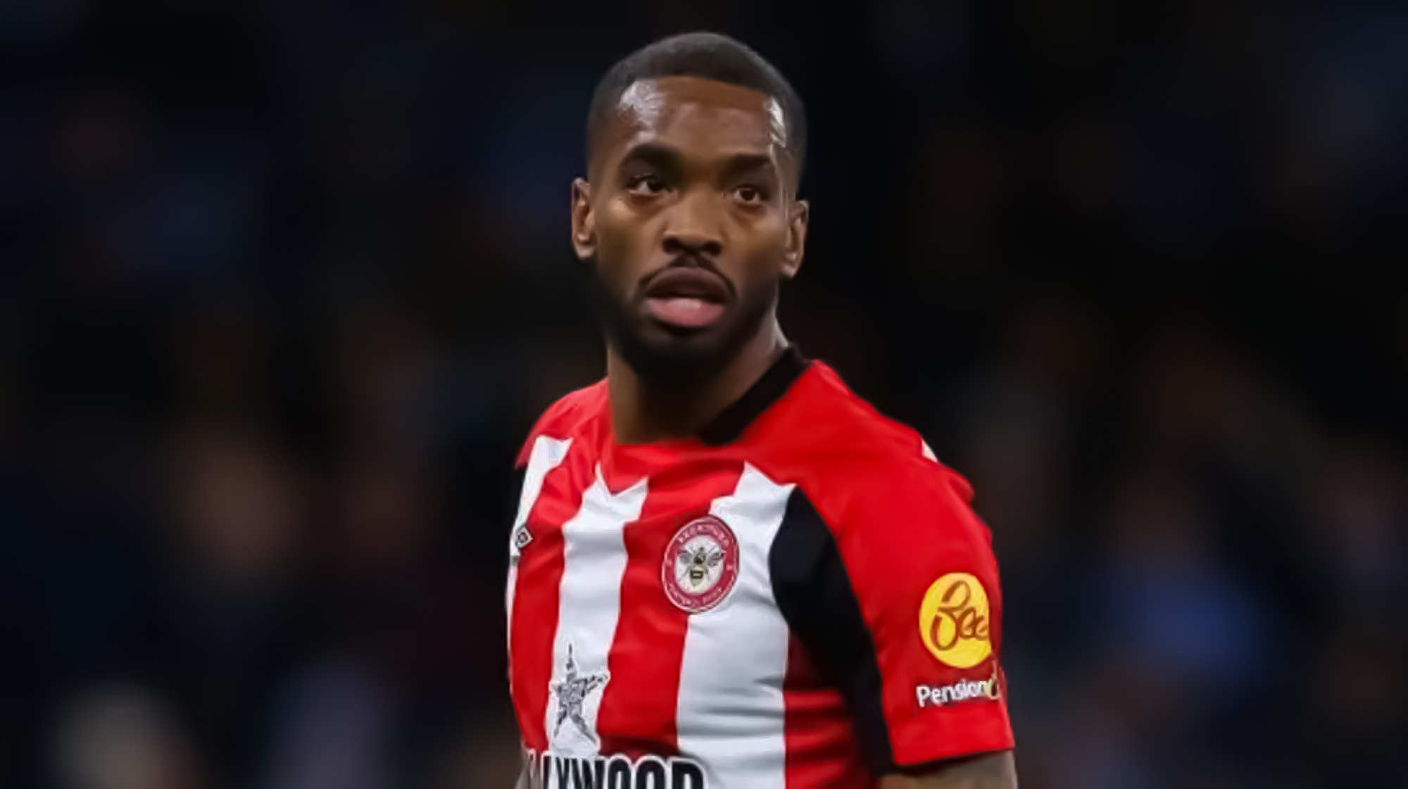 Ivan Toney Dressed in Brentford's Home Red and White Kit During a Past Match.