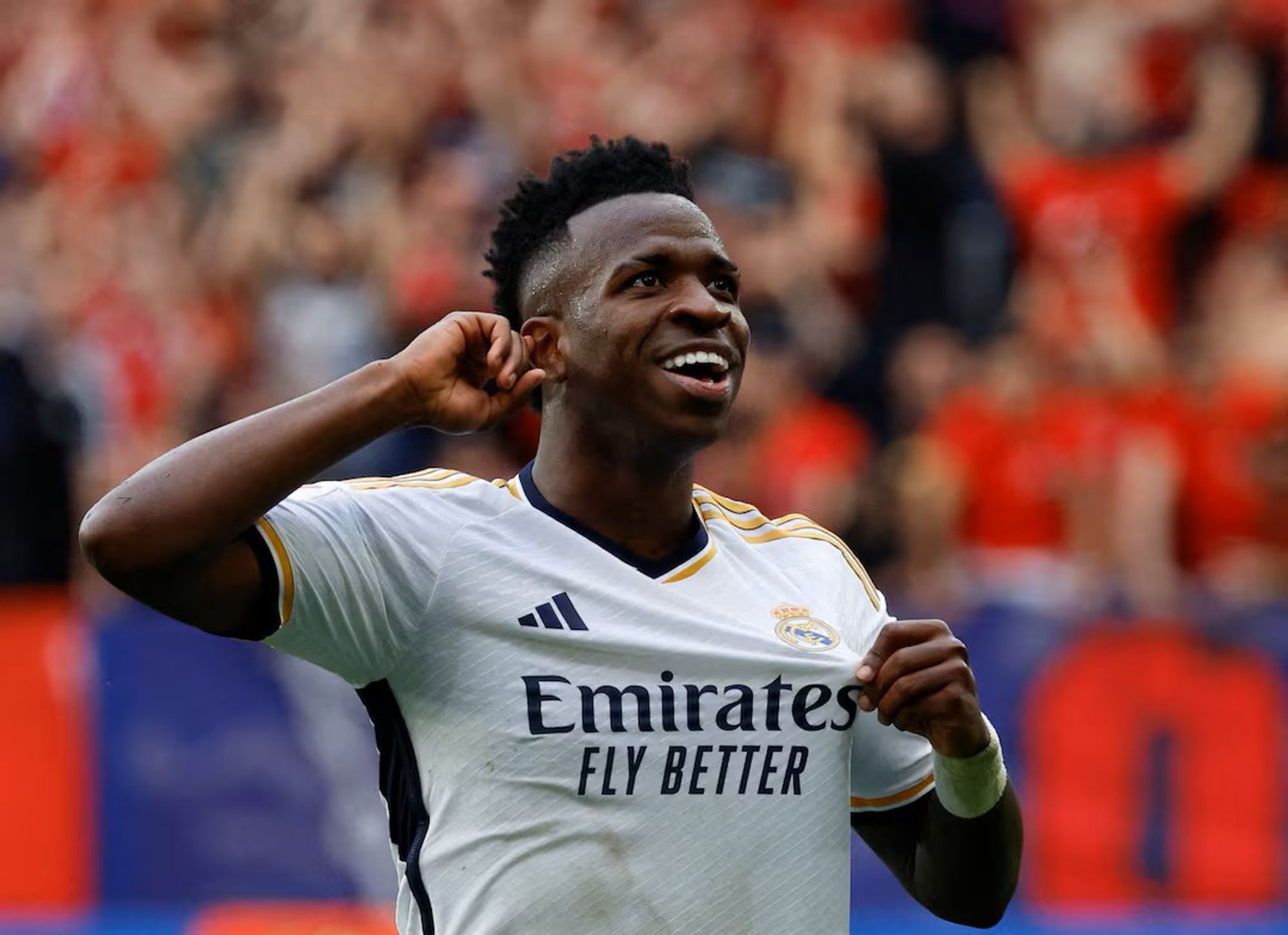 Vinicius Jr. gestures to the Crowd By Touching His Ear During a Goal Celebration in a Past Match.