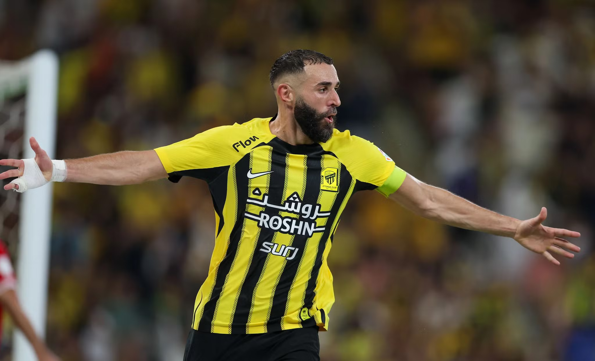 Al Ittihad captain Karim Benzema celebrates one of his goals against Al Wehda, where he completed a hattrick.