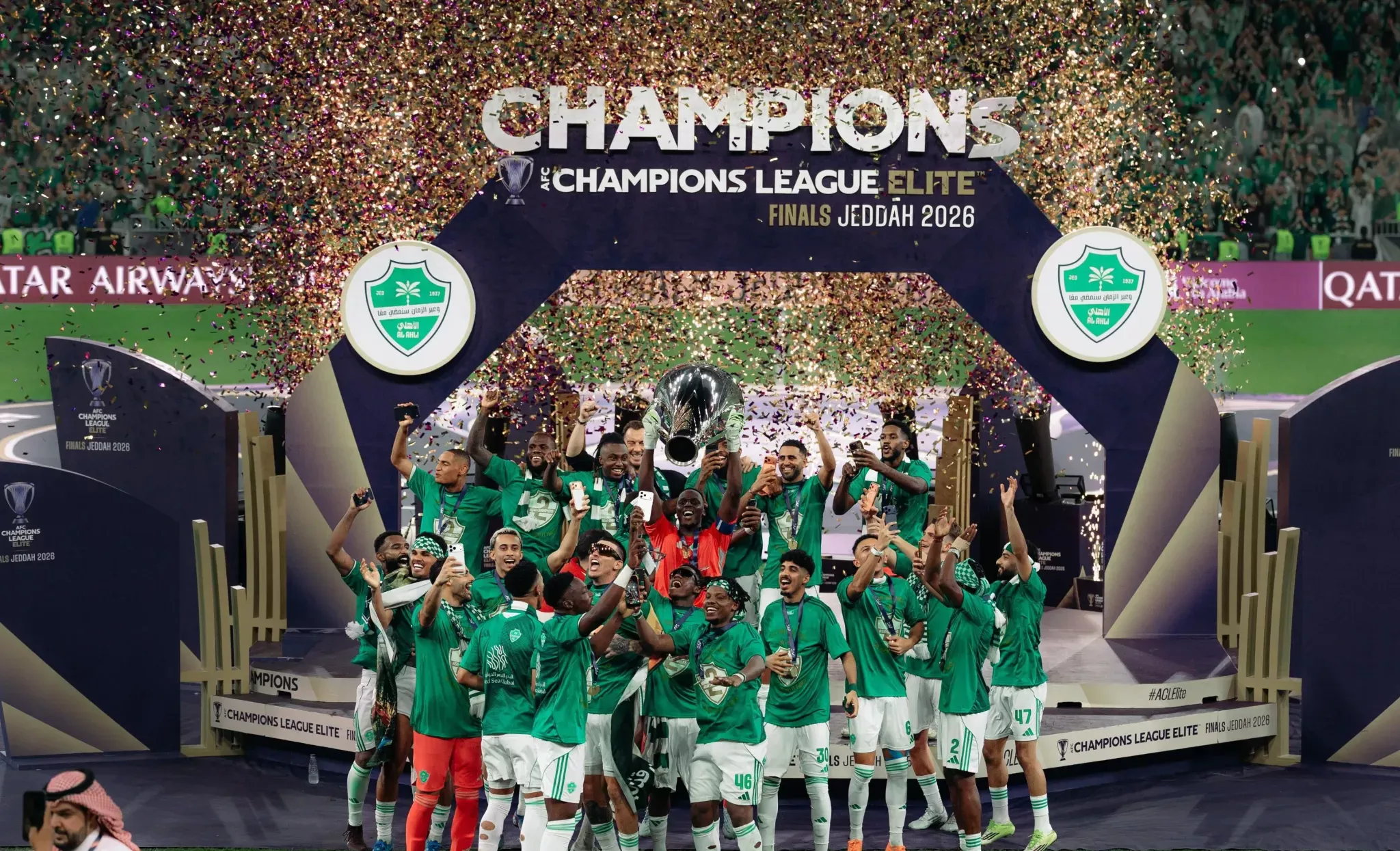Al Ahli players lift the AFC Champions League Elite trophy after defeating FC Machida Zelvia