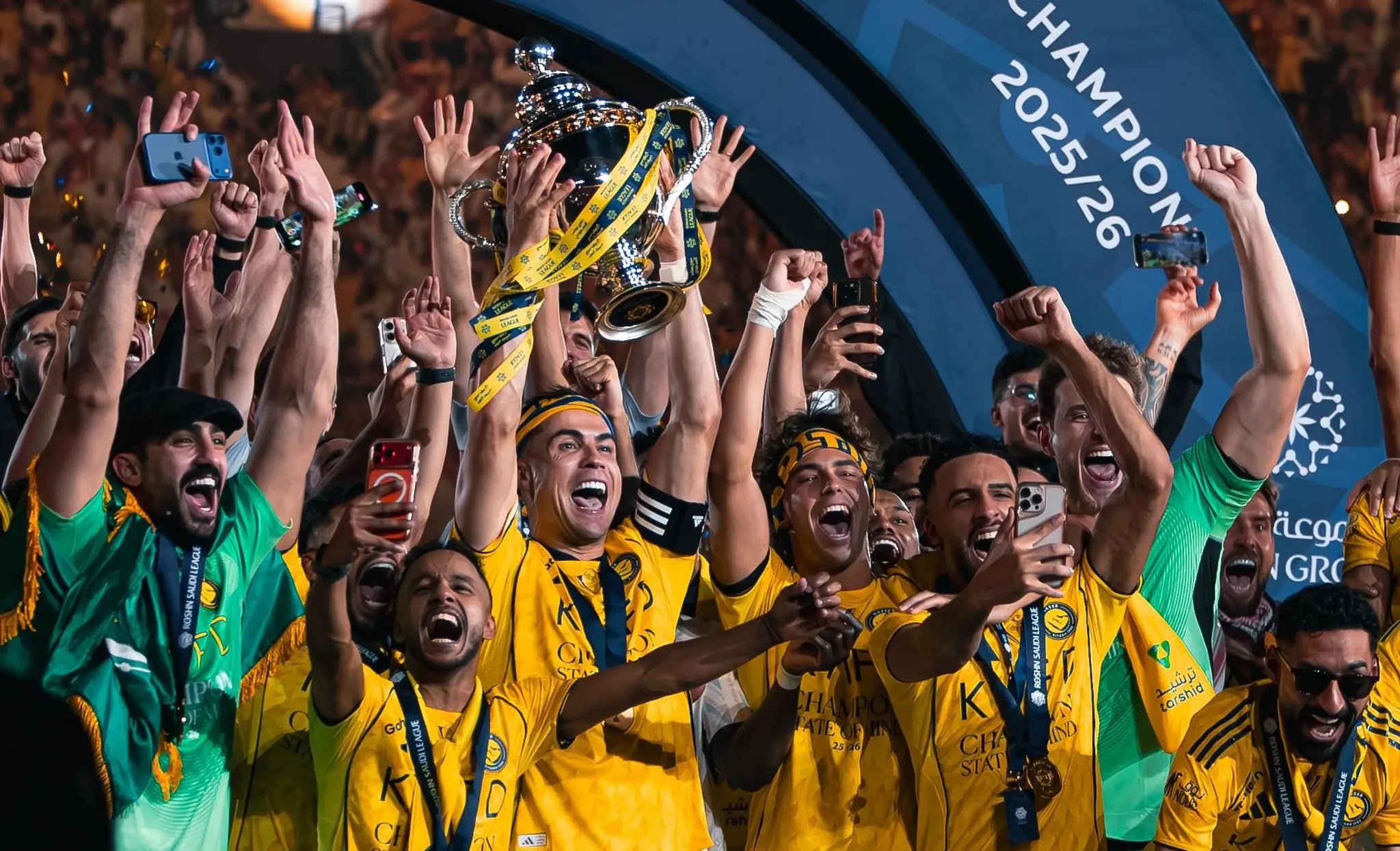 Cristiano Ronaldo celebrates with Al Nassr teammates after winning the 2025-26 Saudi Pro League title